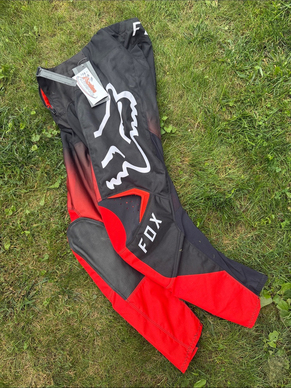 Fox 180 Leed Pant. Red and Black Motocross Pants with White Logo